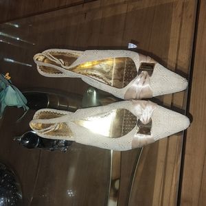A lovely pair of slingback heels..pre-owned and well-loved! ALL OFFERS WELCOMED!